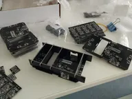 Black acrylic enclosure panels and components prepared for assembly Black acrylic enclosure panels and components prepared for assembly