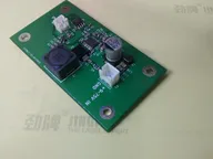 Compact DC power board labeled for 9-75 V input with an inductor and two JST connectors Compact DC power board labeled for 9-75 V input with an inductor and two JST connectors