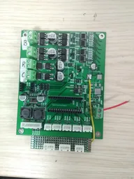 Main prototype control board with labeled B, R, and C output terminals and a piggyback connector board Main prototype control board with labeled B, R, and C output terminals and a piggyback connector board