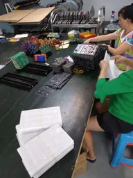 Workers assembling batches of Koi science devices in a Shenzhen factory Workers assembling batches of Koi science devices in a Shenzhen factory