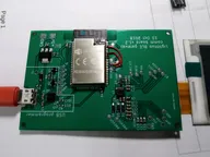 Communication board prototype with an ESP32 module wired into a display cable harness Communication board prototype with an ESP32 module wired into a display cable harness