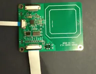 Single reader board prototype with a large printed sensing coil and flat-flex connectors Single reader board prototype with a large printed sensing coil and flat-flex connectors