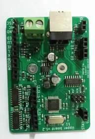 Upper board prototype with a barrel jack, motor and status connectors, and microcontroller circuitry Upper board prototype with a barrel jack, motor and status connectors, and microcontroller circuitry